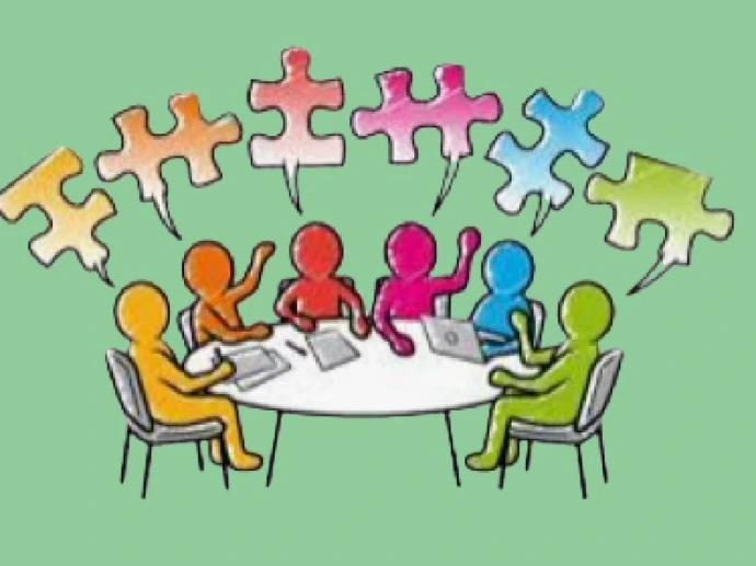 Illustration d’un job dating avec échanges entre candidats et recruteurs autour d’une table